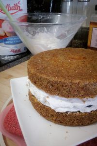 Carrot cake with icing between the two layers